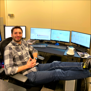 Clement Joly at his desk during his engineering career at SoftInWay while he works at SoftInWay
