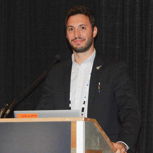 Clement Joly presenting at the TETS conference on behalf of SoftInWay during his engineering career at SoftInWay